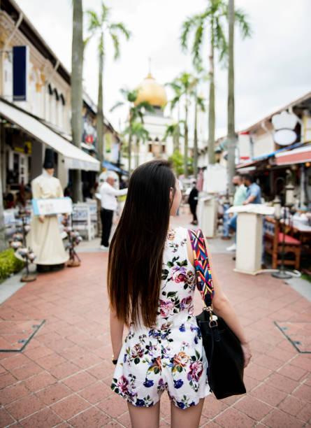 istock Asian woman on a holiday 909463594