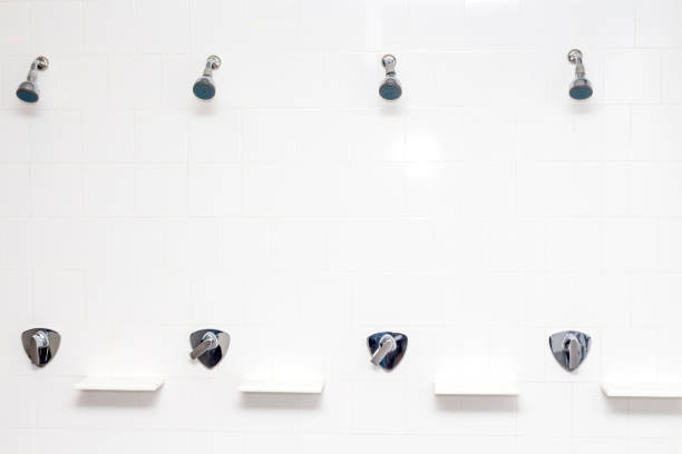 istock Shower head in bathroom 909469428
