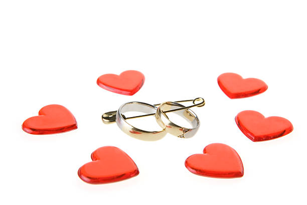 istock wedding rings in safety pin 90947052