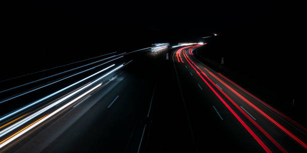 istock Traffic on highway - long exposure, motion blur 909472518