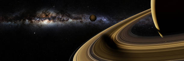 istock Saturn's moon Enceladus casts a long shadow on planet Saturn's rings 909474532
