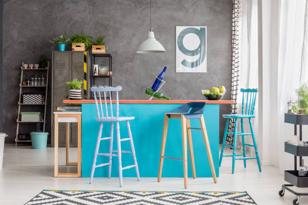 istock Modern kitchen island in apartment 909474608