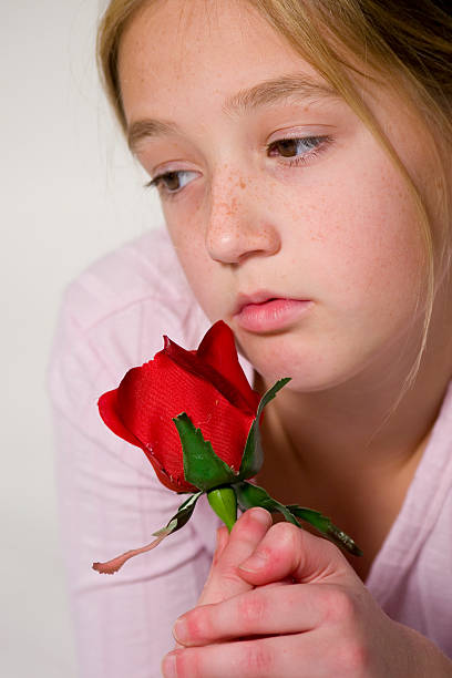 istock girl with rose 3 90947594