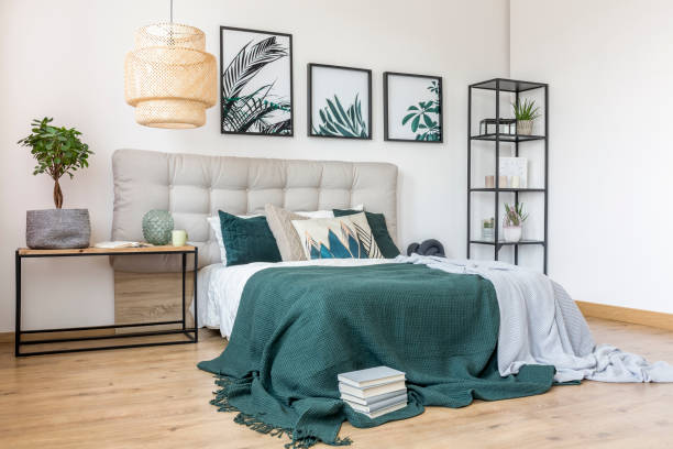 istock Green and grey bedroom interior 909476096