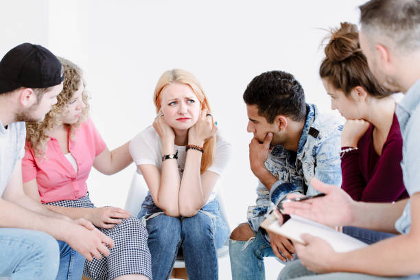 istock Teenagers supporting sad girl 909481028