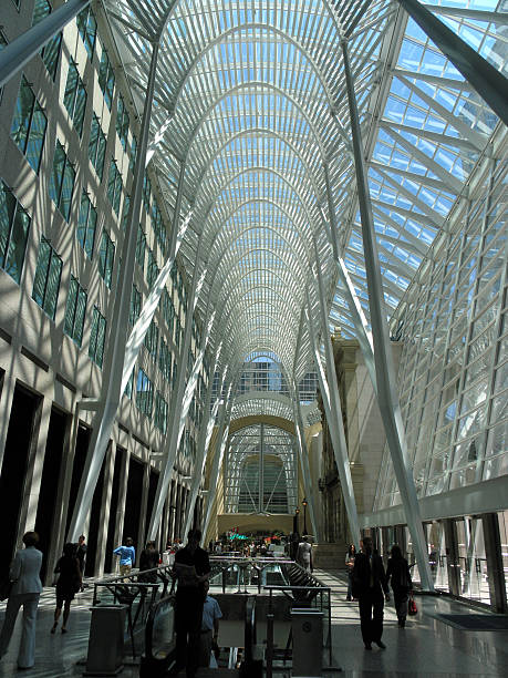 istock Shopping arcade with silhouetted people 90948173