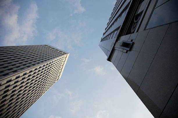 istock two sky scrappers pointing at each other 90948288