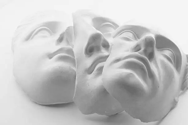 Photo of three white gypsum faces