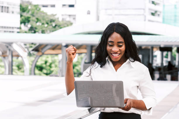 istock African woman working on laptop 909494124