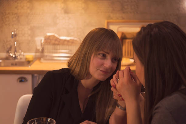 istock Lesbian couple celebrating Valentine's day 909494144