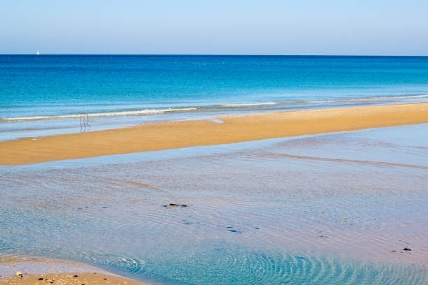 Low tide at mediterranean sea stock photo