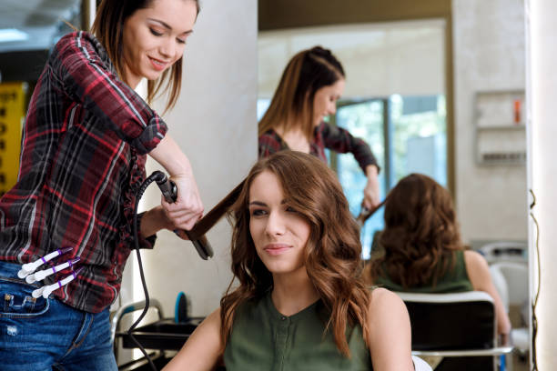 istock Working day inside the hair salon. 909494494