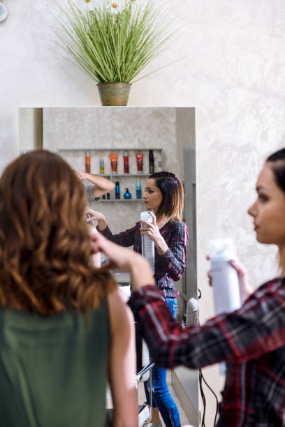istock Working day inside the hair salon. 909494498