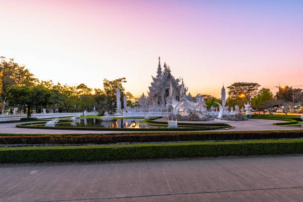 istock Wat Rong Khun(White temple)at sunset in Chiang Rai,Thailand. 909495100