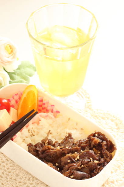 istock homemade barbecue beef and rice 909495822