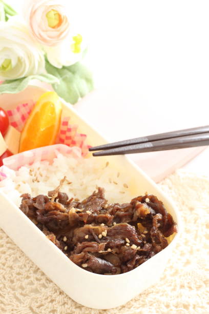 istock homemade barbecue beef and rice 909495968