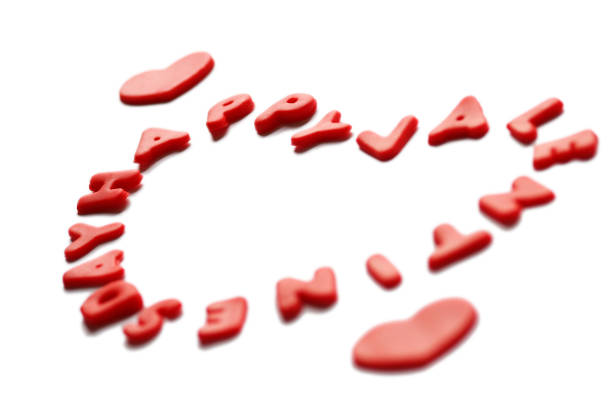 heart shaped, red colored happy valentine's day letters made off playdoh. 14 february.valentine's day background concept and holiday celebration. copy space for text.with depth of field. - playdoh imagens e fotografias de stock