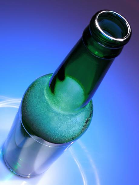 beer bottle  froth beer bubble quencher stock pictures, royalty-free photos & images