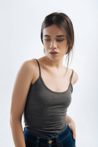 Dreamful gorgeous woman hiding her look