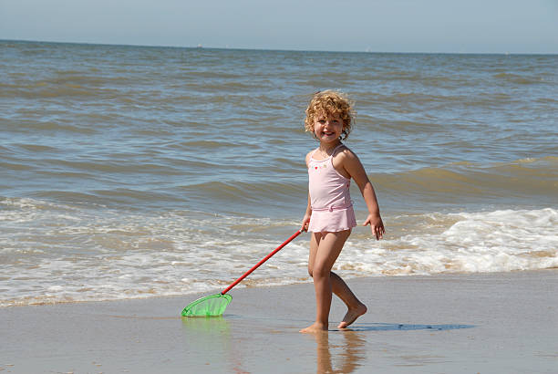 istock girl at the beach 90951616