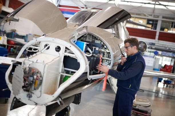 istock Aircraft mechanic in the hangar 909517308