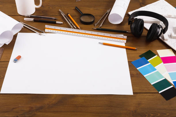 istock Decorator workplace with color swatches and tools 909522274