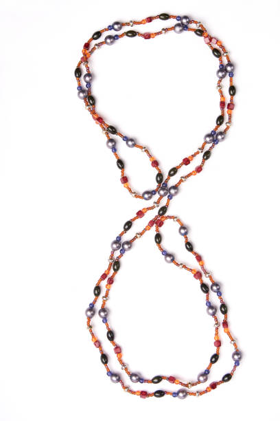 istock Number eight necklace over white background 909522990