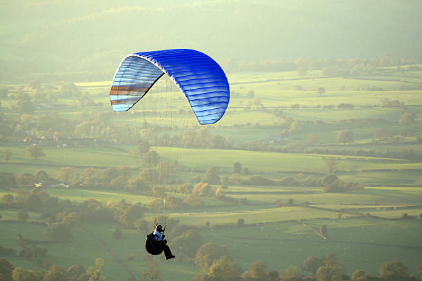 istock Paraglider high above the rural countryside 90952528