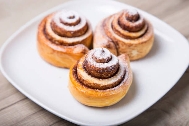 Fresh rolls rolls with Cinnamon in the form of. Flavorful pastries.
