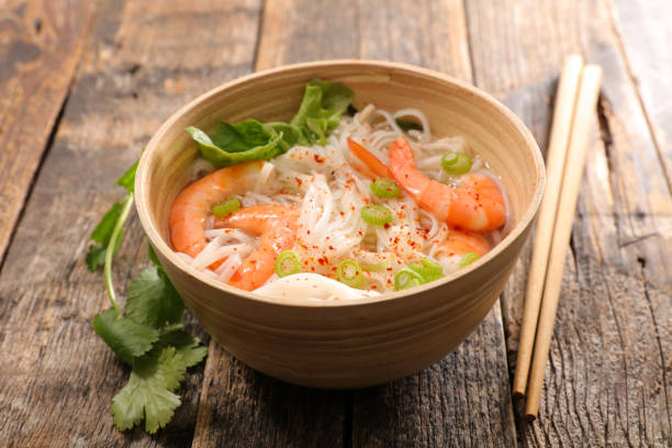 istock bowl of noodle soup with shrimp 909526478