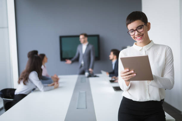 istock Business people conference in modern office 909529196