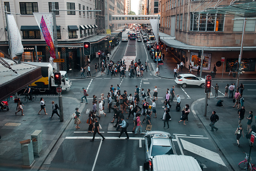 Sydney, Australia - December 7, 2017: People crossing viewed from above.
