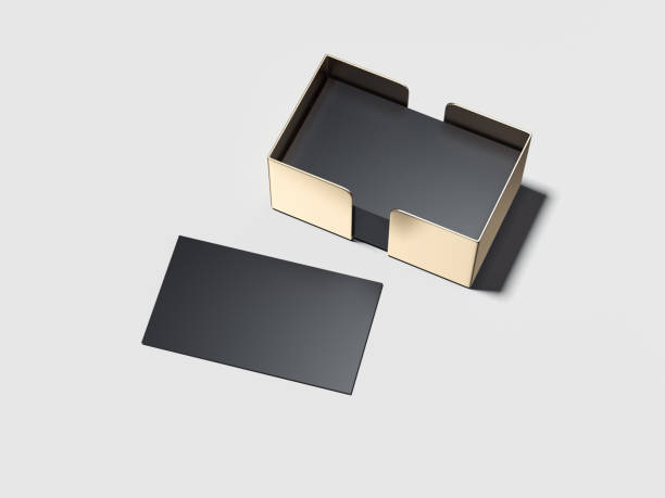 istock Blank black business cards with golden holder. 3d rendering 909550406