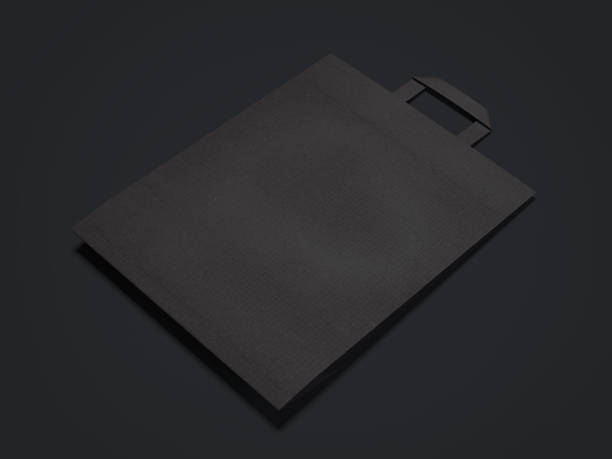 istock Black paper shopping bag. 3d rendering 909553602