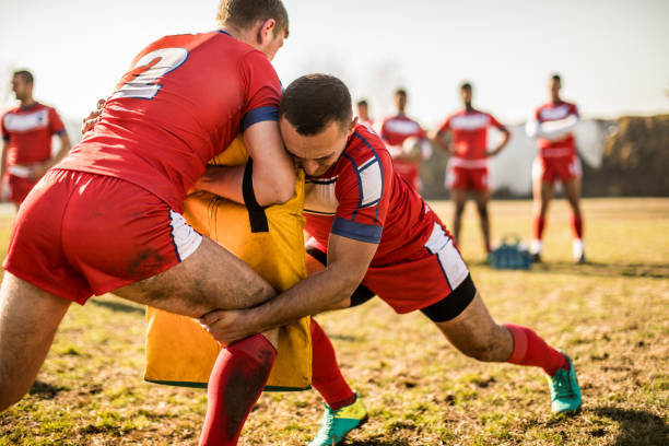 istock Men playing rugby outdoors 909557570