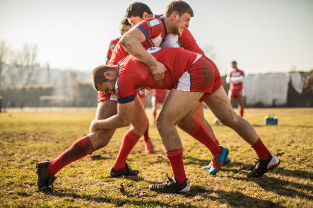 istock Rugby players doing warm up exercises 909557790