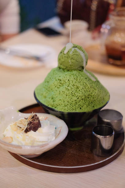 istock Green tea Bingsu (Korean ice dessert) with green tea ice cream 909558736