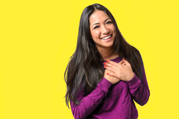 istock Young woman showing her heartfelt gratitude 909561792