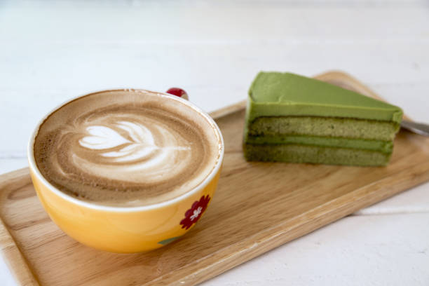 coffee and cake in wood plate on table