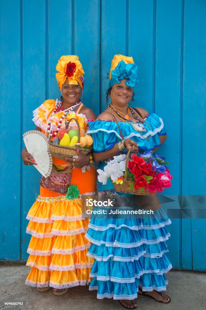 elegant Amount of Emotion Two Cuban Ladies In Traditional Costume Placa De Les Armas Havana Stock  Photo - Download Image Now - iStock