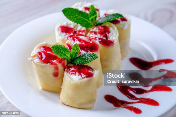 Pancakes Stuffed With Cottage Cheese On A White Plate Stock Photo - Download Image Now