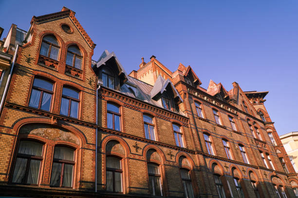 istock The facade of old red brick building 909568812
