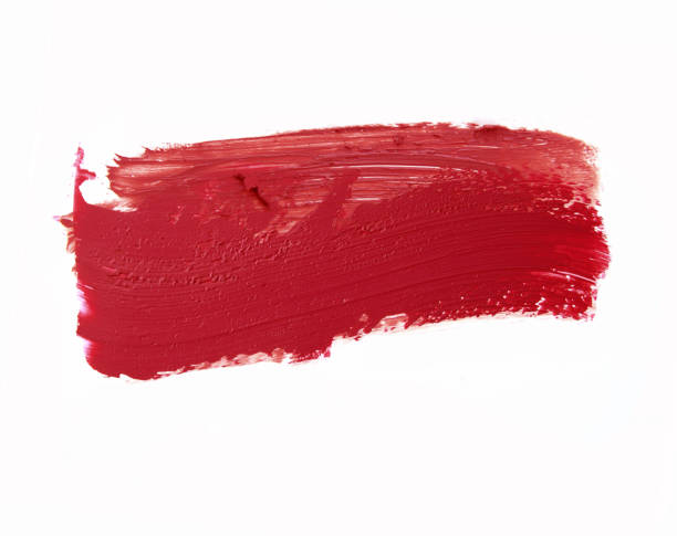 istock Red color lipstick stroke on white 909569026