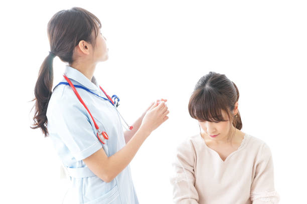 istock Nurse putting woman on a drip 909569530