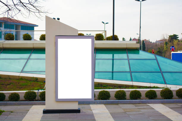 istock blank vertical street billboard stand with city background 909570122