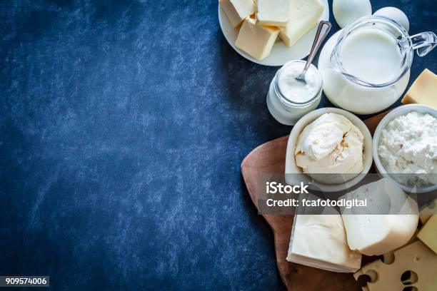 Dairy Products Shot On Bluish Tint Background Stock Photo - Download Image Now - Dairy Product, Cheese, Milk