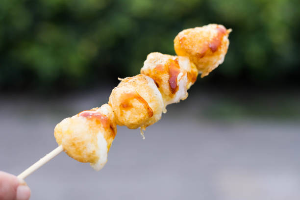 istock Taiwanese street food : Deep fried quill eggs with sausage inside for snack or appetizer from night market 909581876