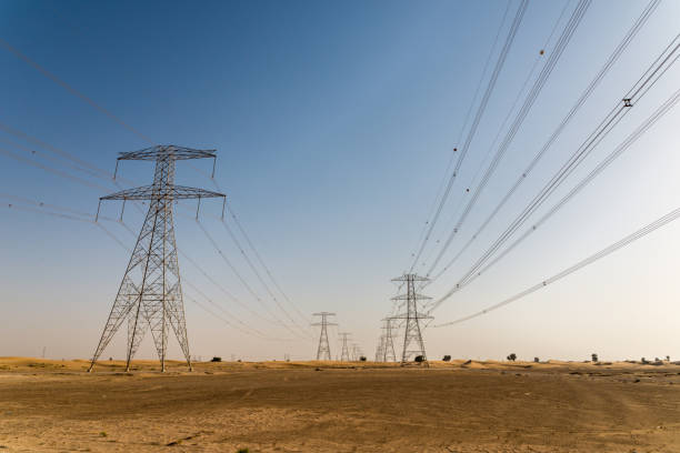 istock Giant electricity cables in the desert 909596962