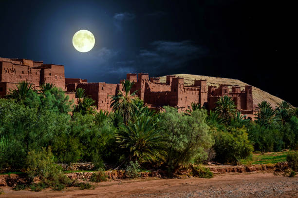 Kasbah Ait Ben Haddou in the desert near Atlas Mountains at night, Morocco Kasbah Ait Ben Haddou in the desert near Atlas Mountains at night, Morocco casbah stock pictures, royalty-free photos & images