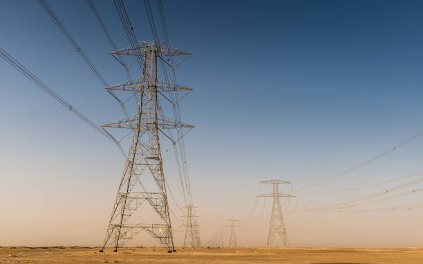 istock Giant electricity cables in the desert 909597476